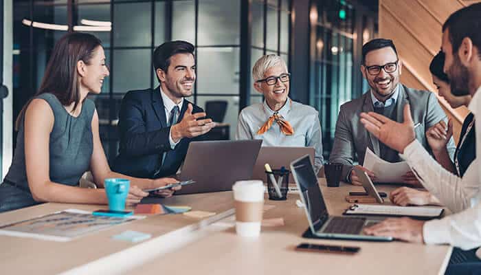 For Businesses - Startup Stride - Startup Stride Generational Equity Lawsuit impact illustrated by business professionals discussing legal and compliance issues in a corporate meeting