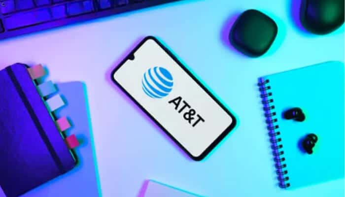 Who can use the ATT MyResults portal - Startupstride - Startup Stride Smartphone on a desk showing AT&T logo illustrating att my results mobile access and workforce dashboard