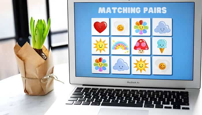 Matching pairs - Startupstride - Startup Stride Laptop displaying matching pairs in the Google Memory Game to improve memory and concentration skills
