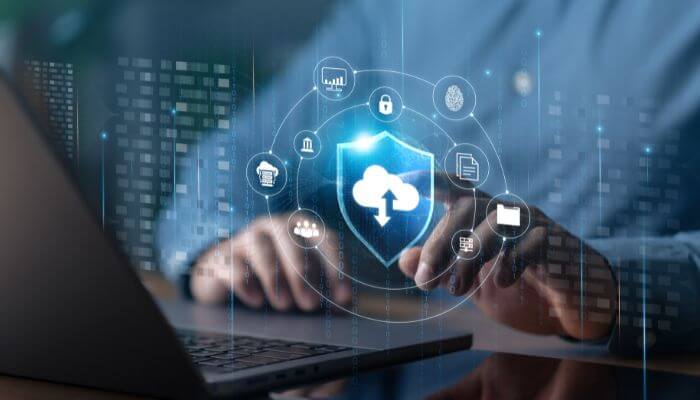 How Cloud Computing Works 2 - Startup Stride Droven.io Cloud Computing Guide showing secure cloud storage, data protection icons and a professional using a laptop.